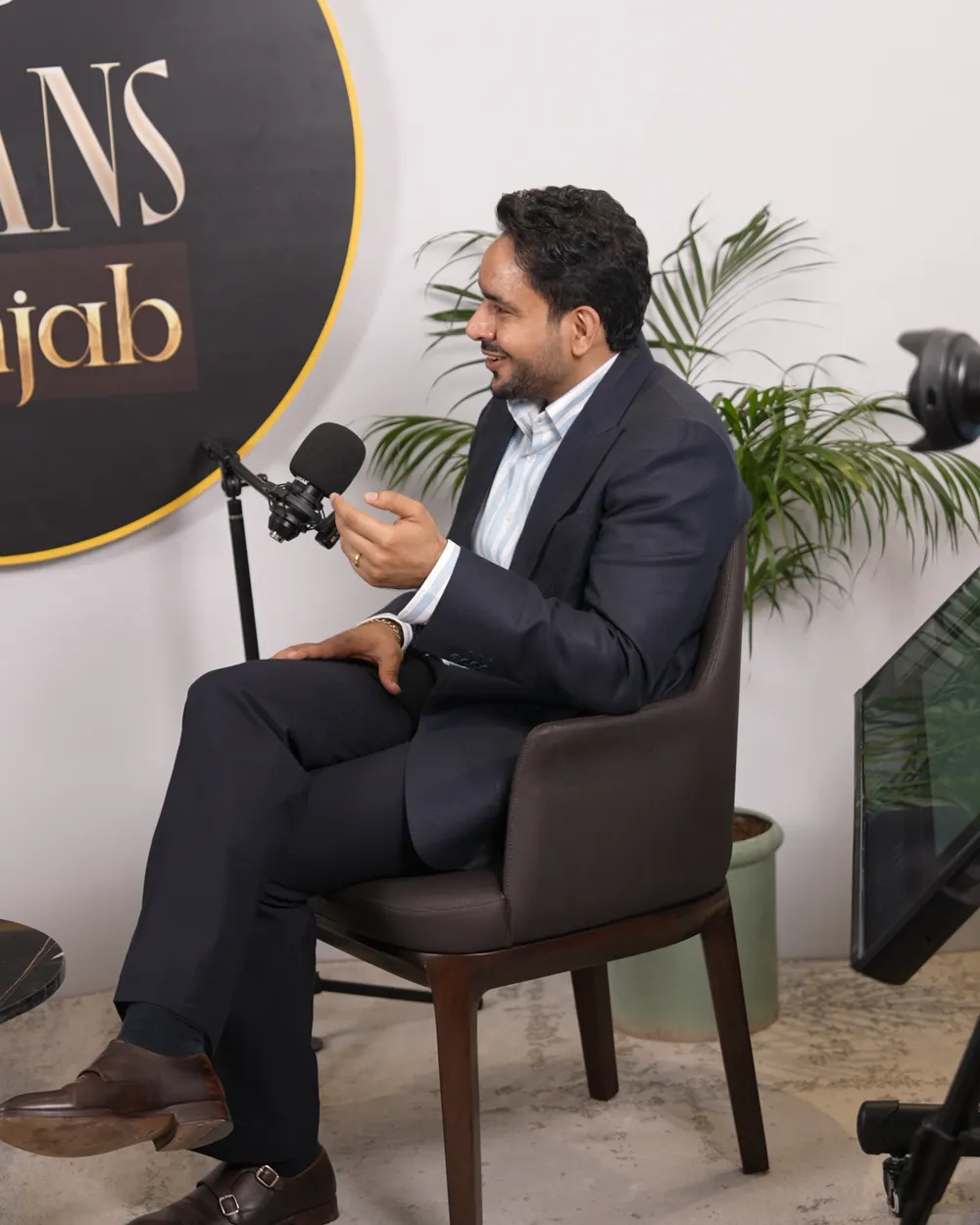 Amrit Deol seated on the Titans of Punjab set